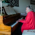 woman playing the piano